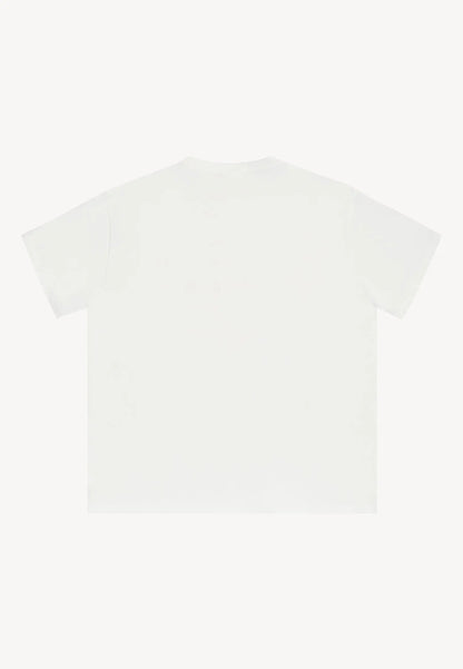 Bawełniany t-shirt z autorskim nadrukiem TISHAL kremowy