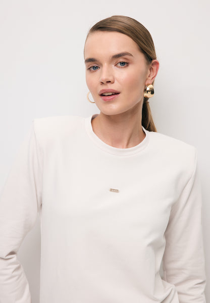 Kremowy longsleeve z poduszkami na ramionach MELISSANDRA