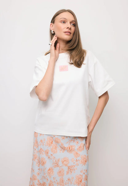Kremowy T-shirt oversize z logo PARADISO