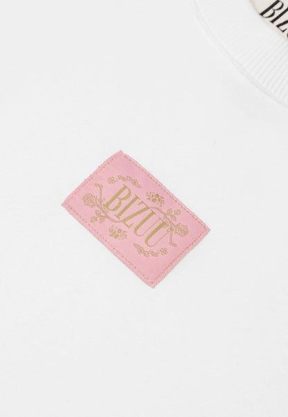 Kremowy T-shirt oversize z logo PARADISO