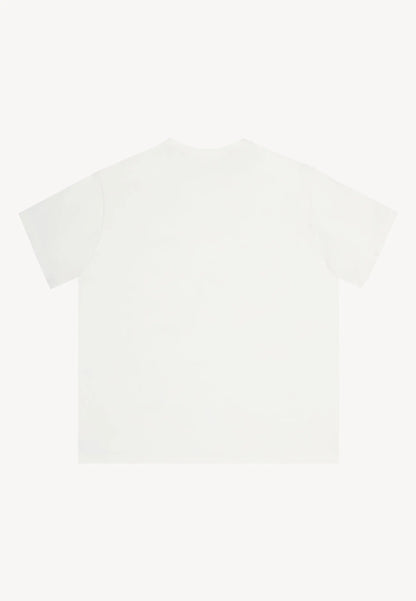 Kremowy T-shirt oversize z nadrukiem RALZA